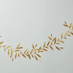 75.5”L X .125” X 6” GOLD METAL AMULET GARLAND 6 75.5”L X .125” X 6” GOLD METAL AMULET GARLAND -Home Decor Store 755l x 125 x 6 gold metal amulet garland 2