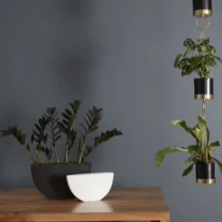 5.75”H X 10.25”L X 2.5”W BLACK CERAMIC ANNELI BOAT -Home Decor Store accent decor 575h x 1025l x 25w black ceramic anne 3